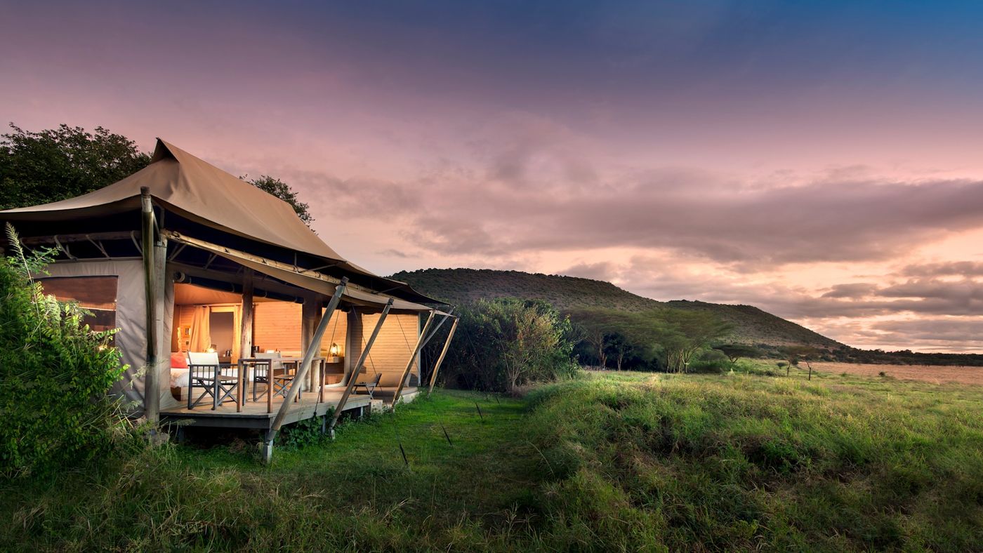 Tented camp at dusk near the Maasai Mara airstrip